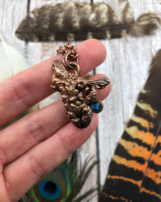 real bee copper pendant with a ethically sourced bee, a piece of lavender and small round blue labradorite
