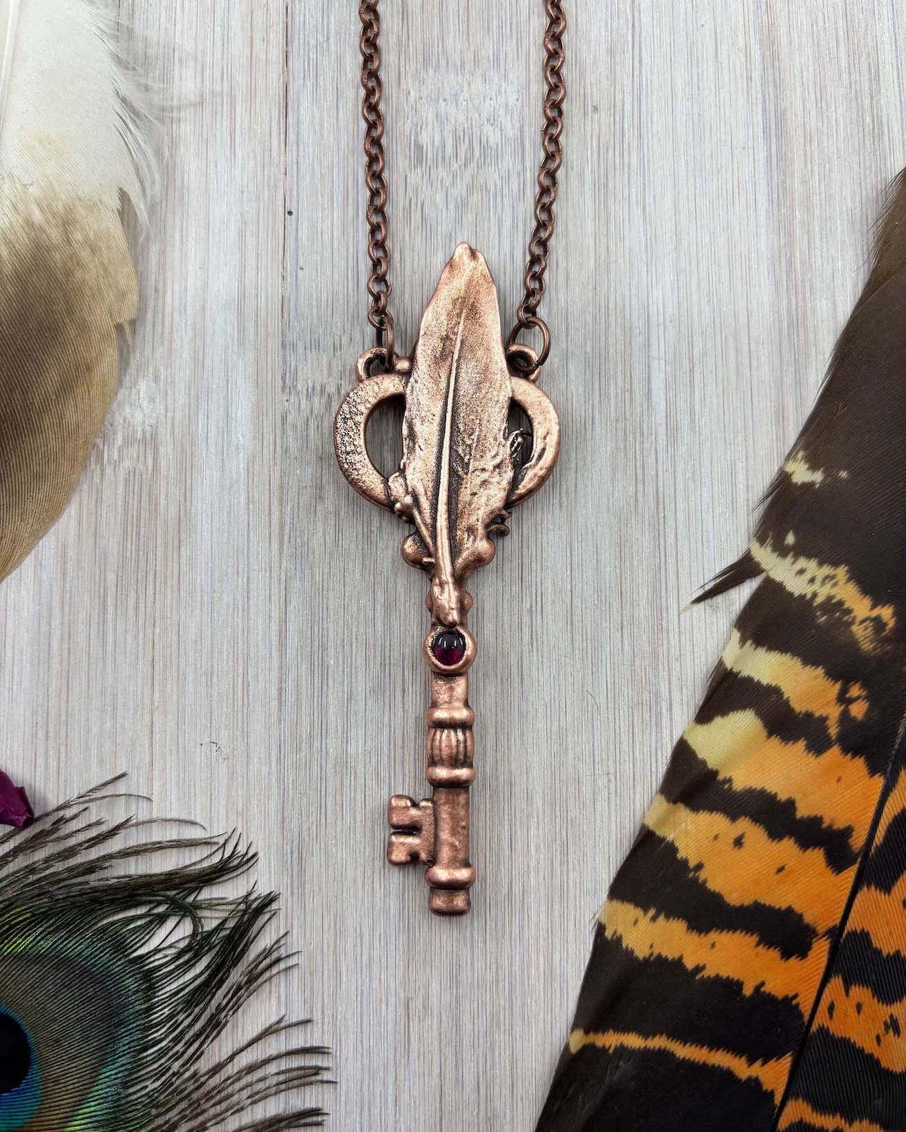 REAL Feather Key Pendant with Garnet - Electroformed