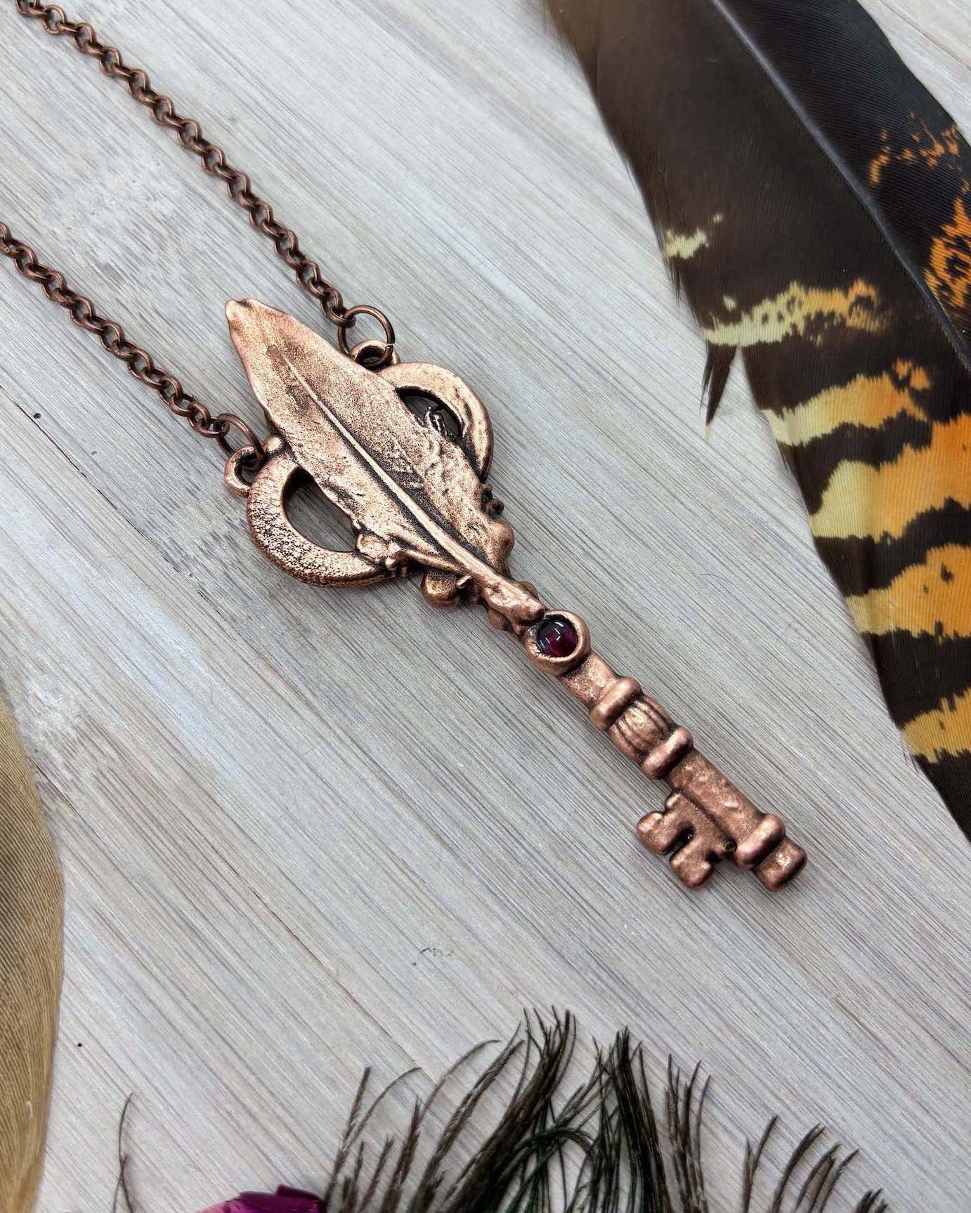 REAL Feather Key Pendant with Garnet - Electroformed