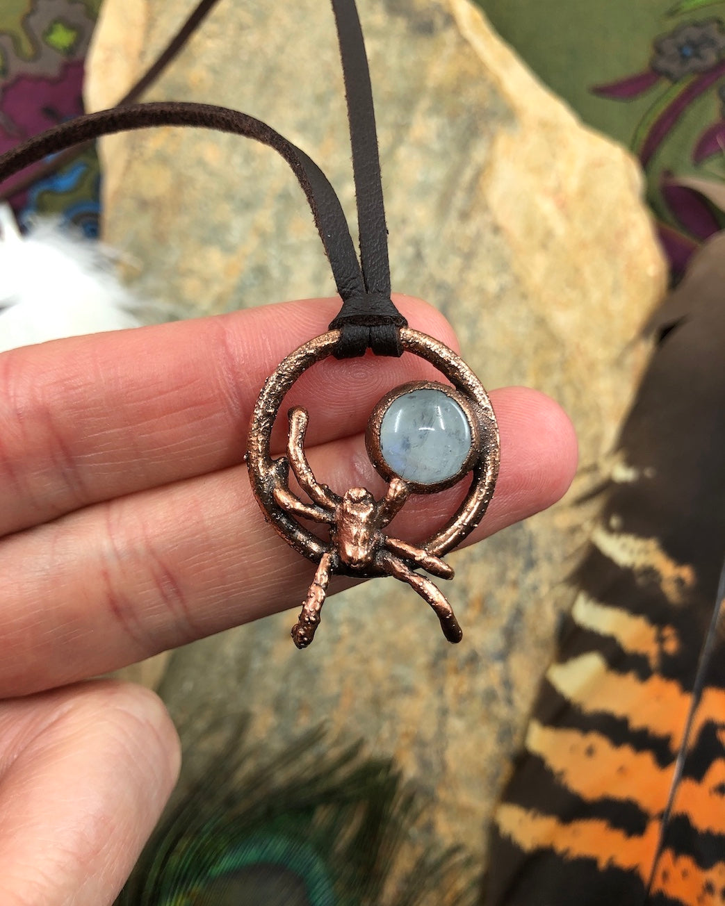 small spider copper pendant with rainbow moonstone, made with a real spider, electroformed