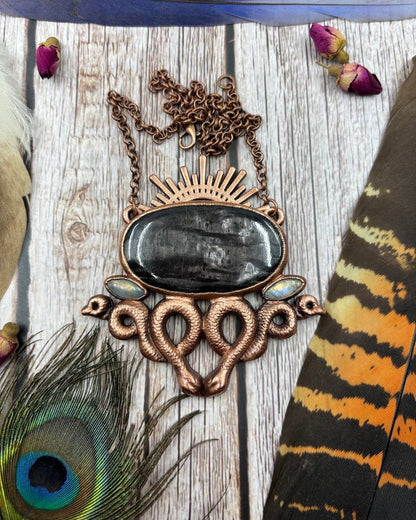 large hypersthene, two rainbow moonstone and double snake copper pendant with sun on top, electroformed