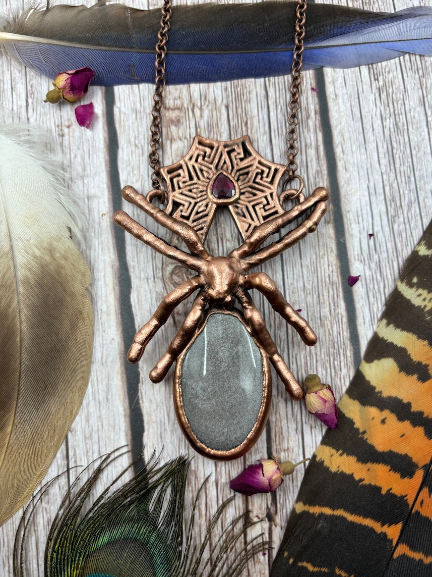 large spider copper pendant with silver sheen obsidian and a small garnet, made with a real large spider, ethically sourced, electroformed