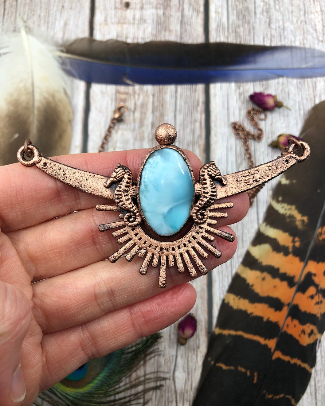 seahorse pendant with Larimar and a sun, made from copper electroforming