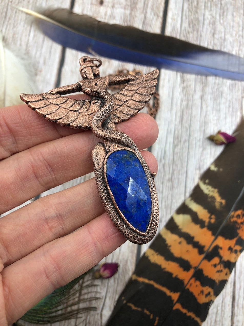 Egyptian Goddess with a snake wrapped around her, Copper Pendant with a faceted lapis lazuli, electroformed