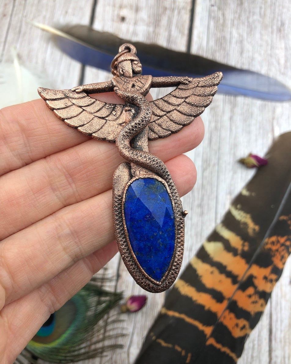 Egyptian Goddess with a snake wrapped around her, Copper Pendant with a faceted lapis lazuli, electroformed