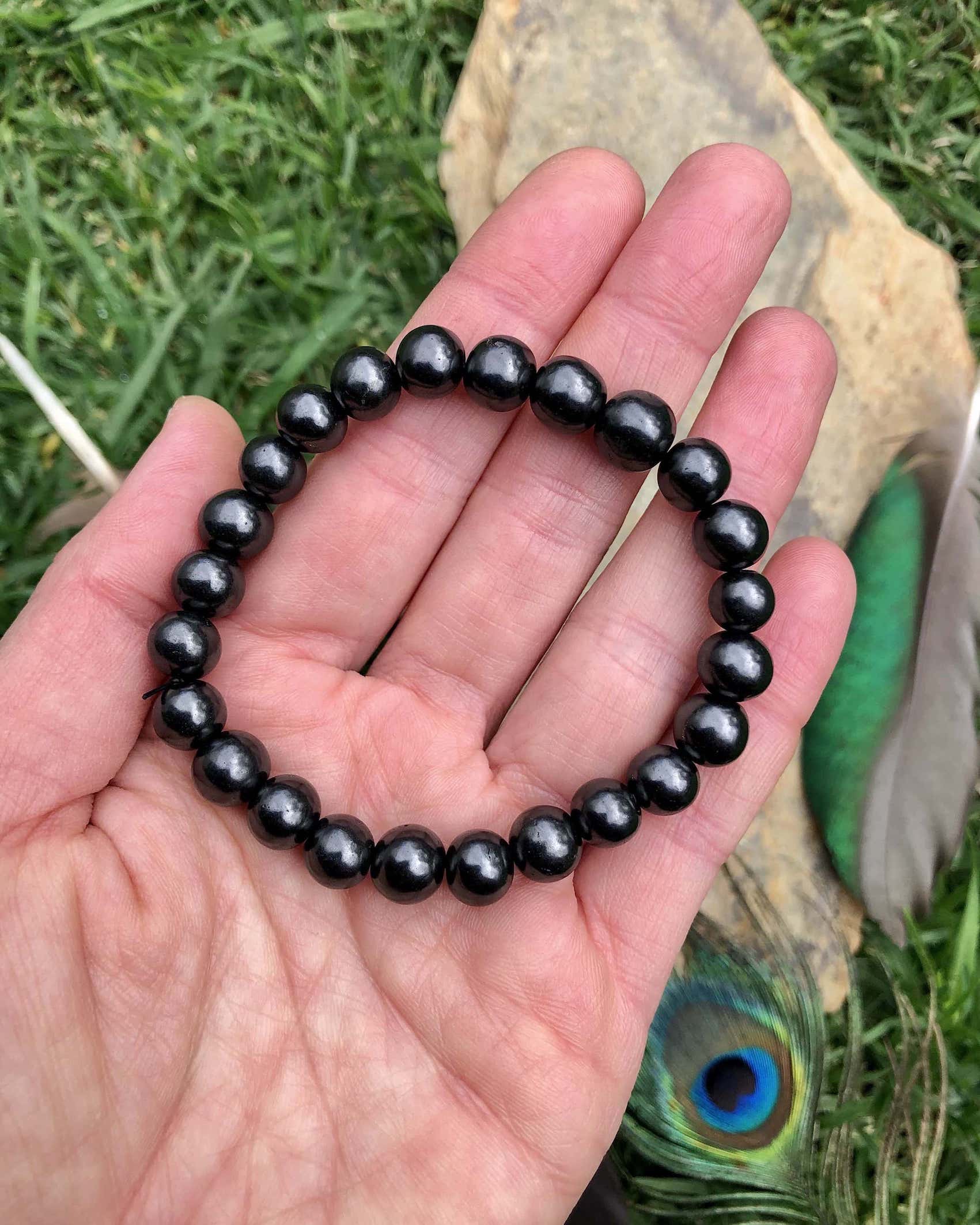 polished shungite bracelet from Zazhoginsky mine Karelia Russia