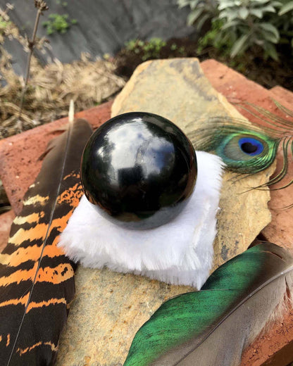 polished shungite sphere from Zazhoginsky mine Karelia Russia