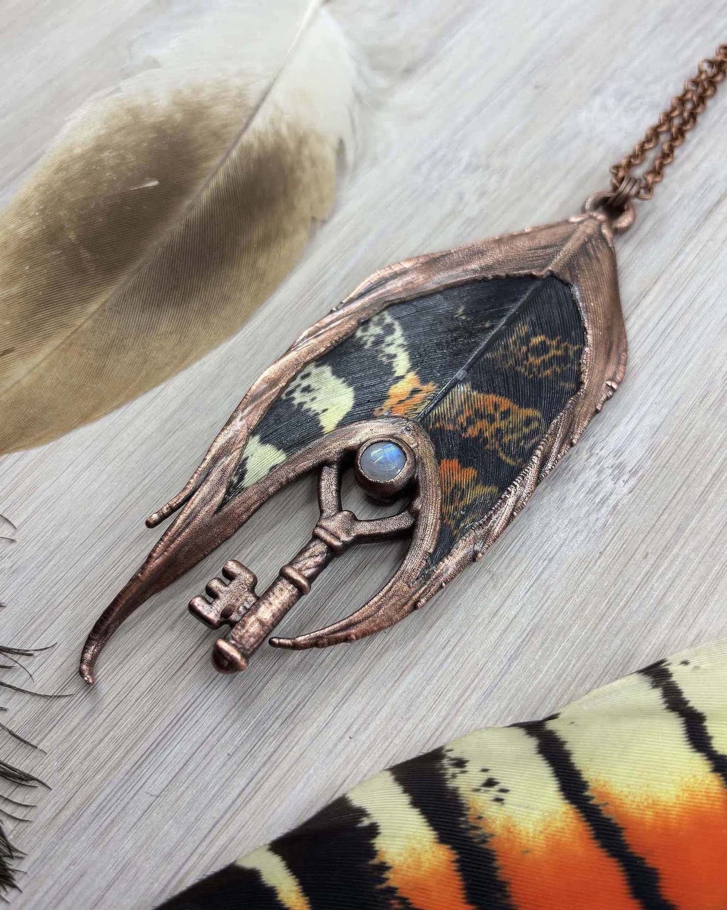 Rainbow Moonstone Black Cockatoo Feather Copper Necklace
