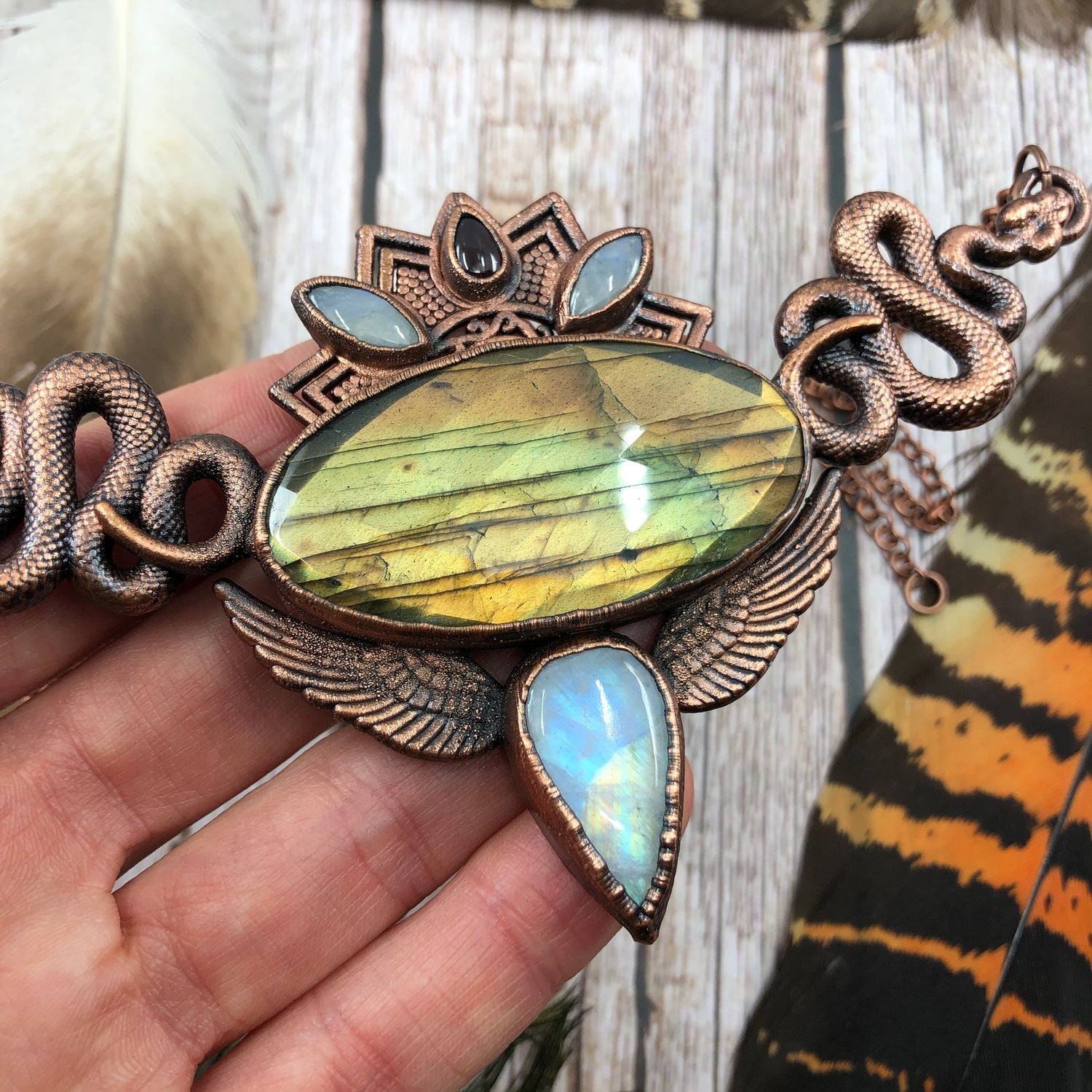 labradorite and rainbow moonstone statement snake bib necklace complete with wings and serpent energy