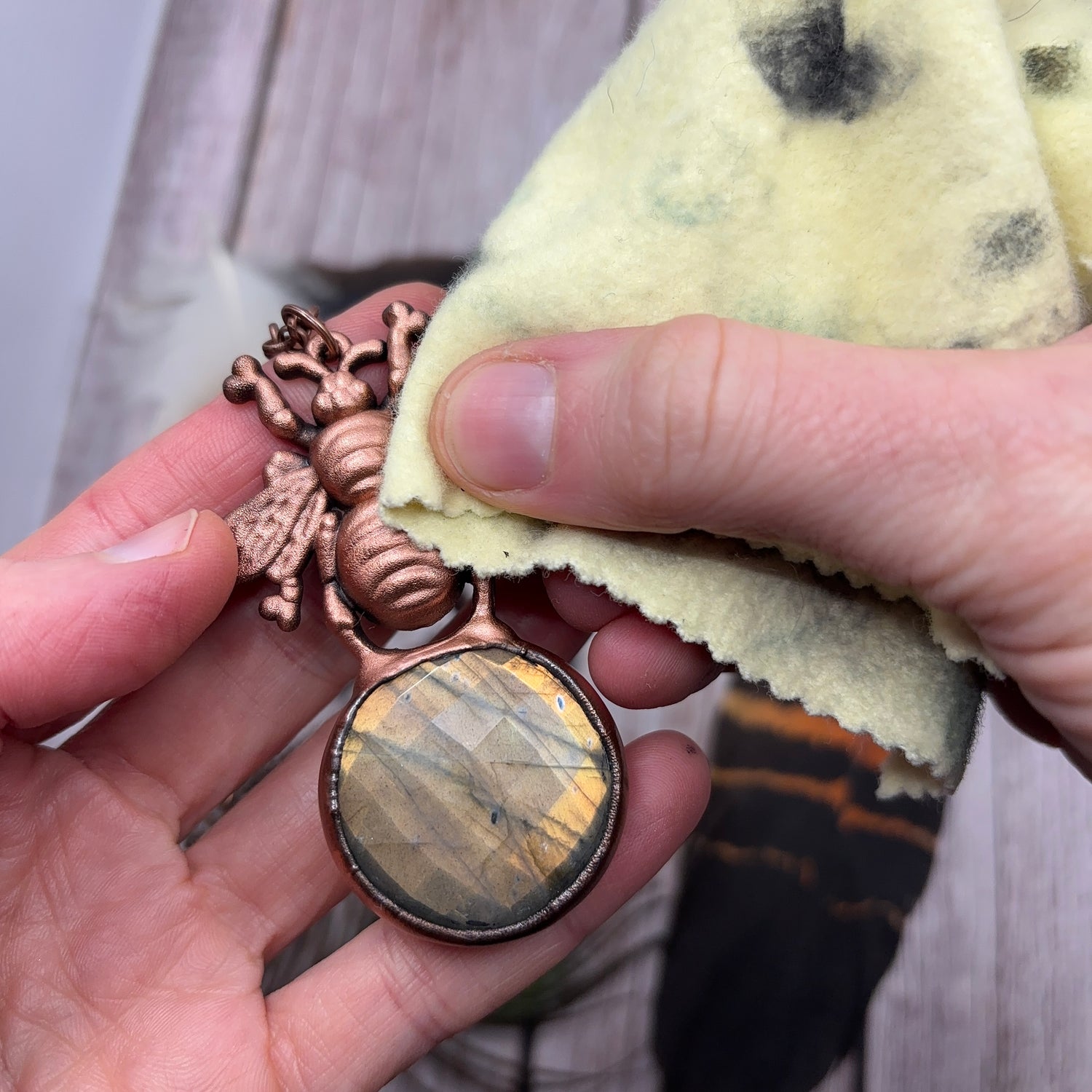 faceted round labradorite bumble bee copper pendant