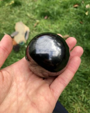 polished shungite sphere from Zazhoginsky mine Karelia Russia